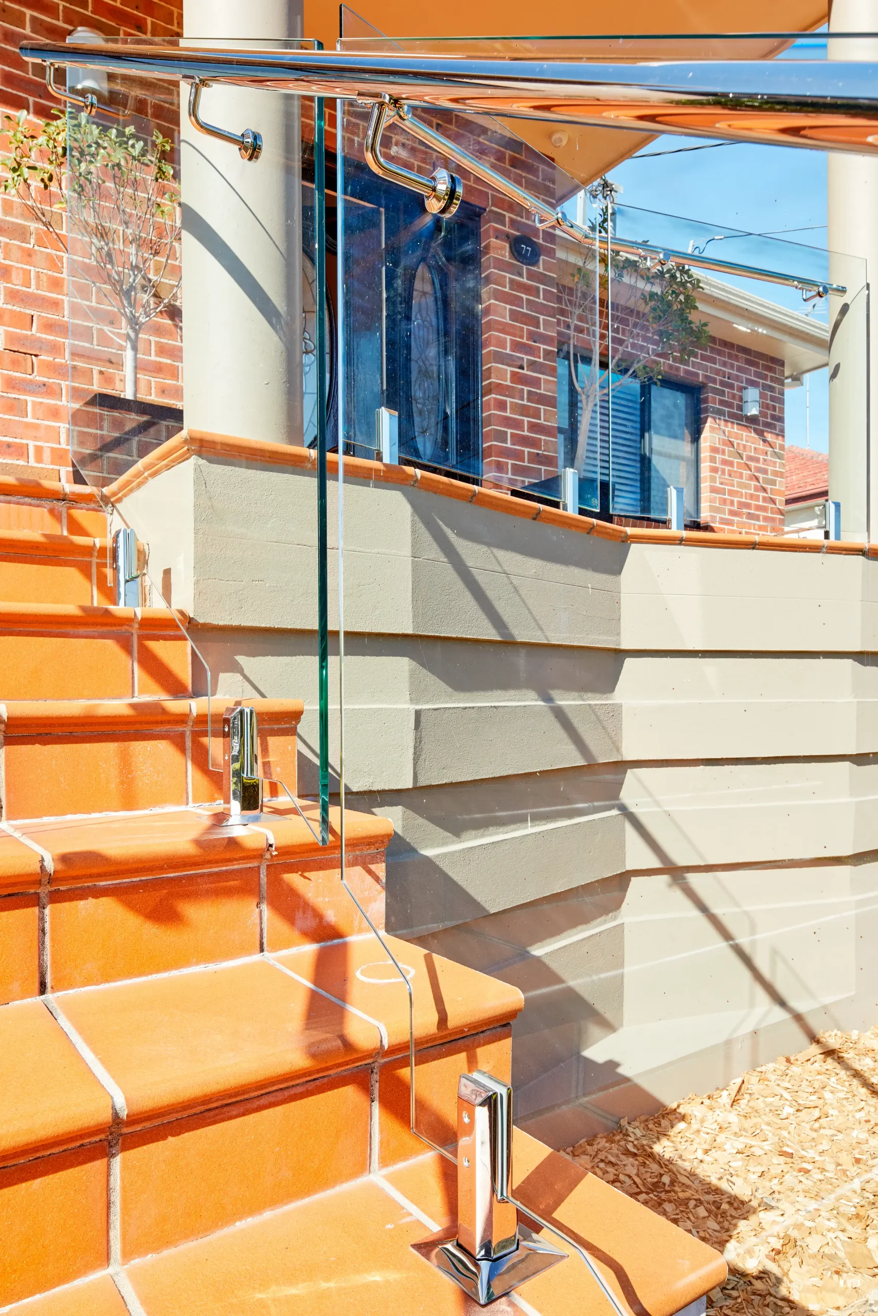 
								Glass stair railings with steel handrail